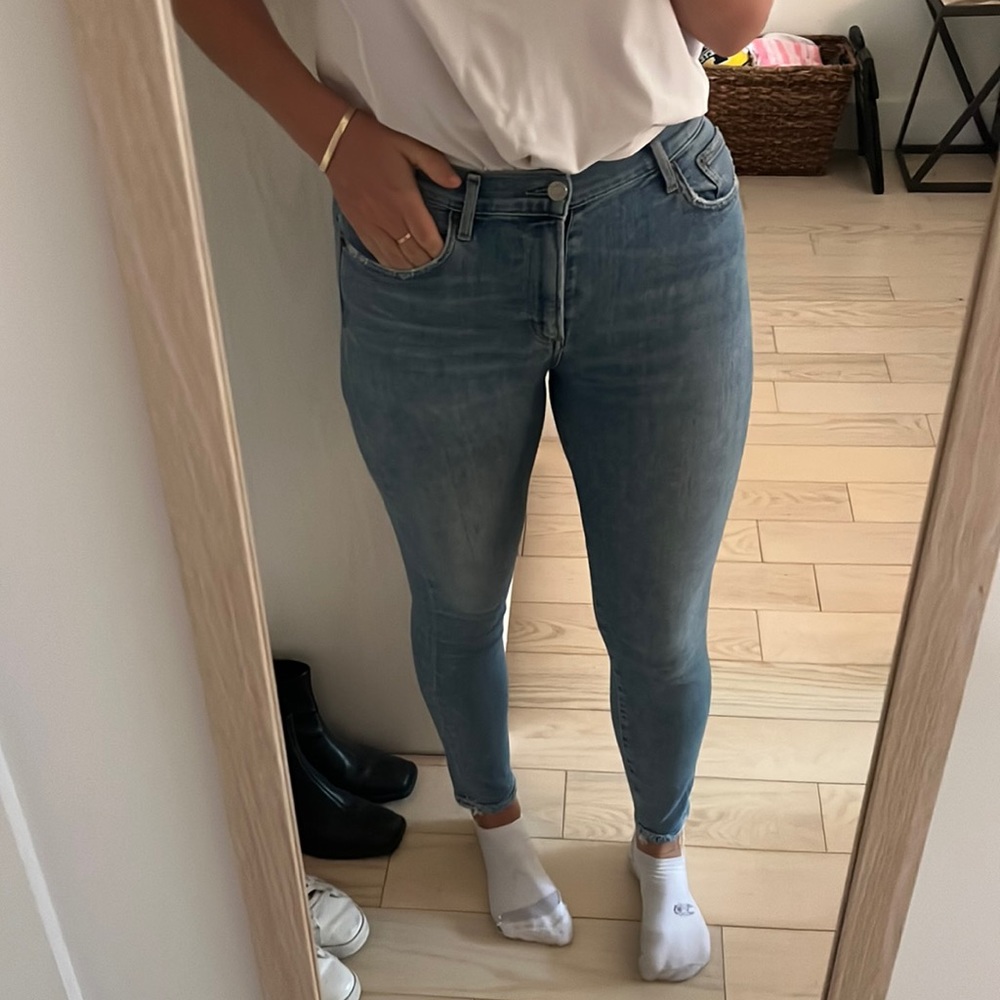aGolde skinny light wash jeans